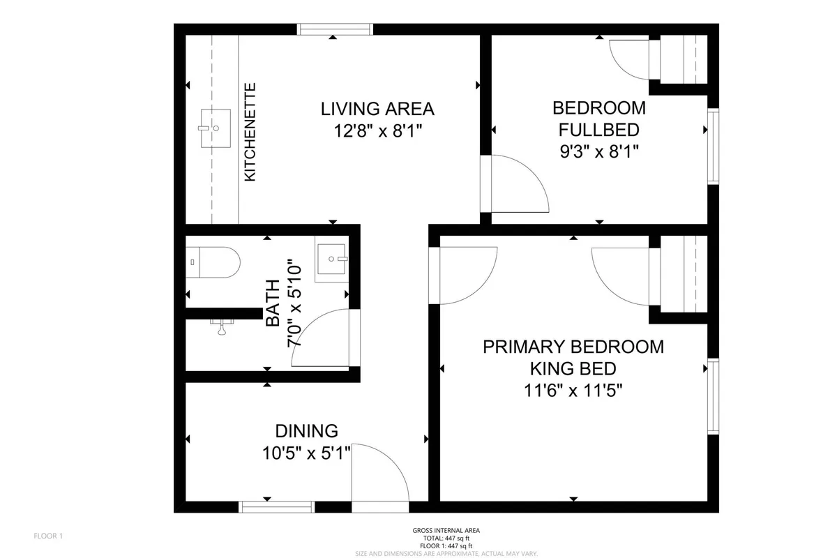 A broad view of the primary bedroom area extending into the living and dining space. The plush king bed stands out as an inviting centerpiece, while glimpses of the kitchenette and dining area suggest open, newly remodeled interiors ideal for both relaxation and gathering.